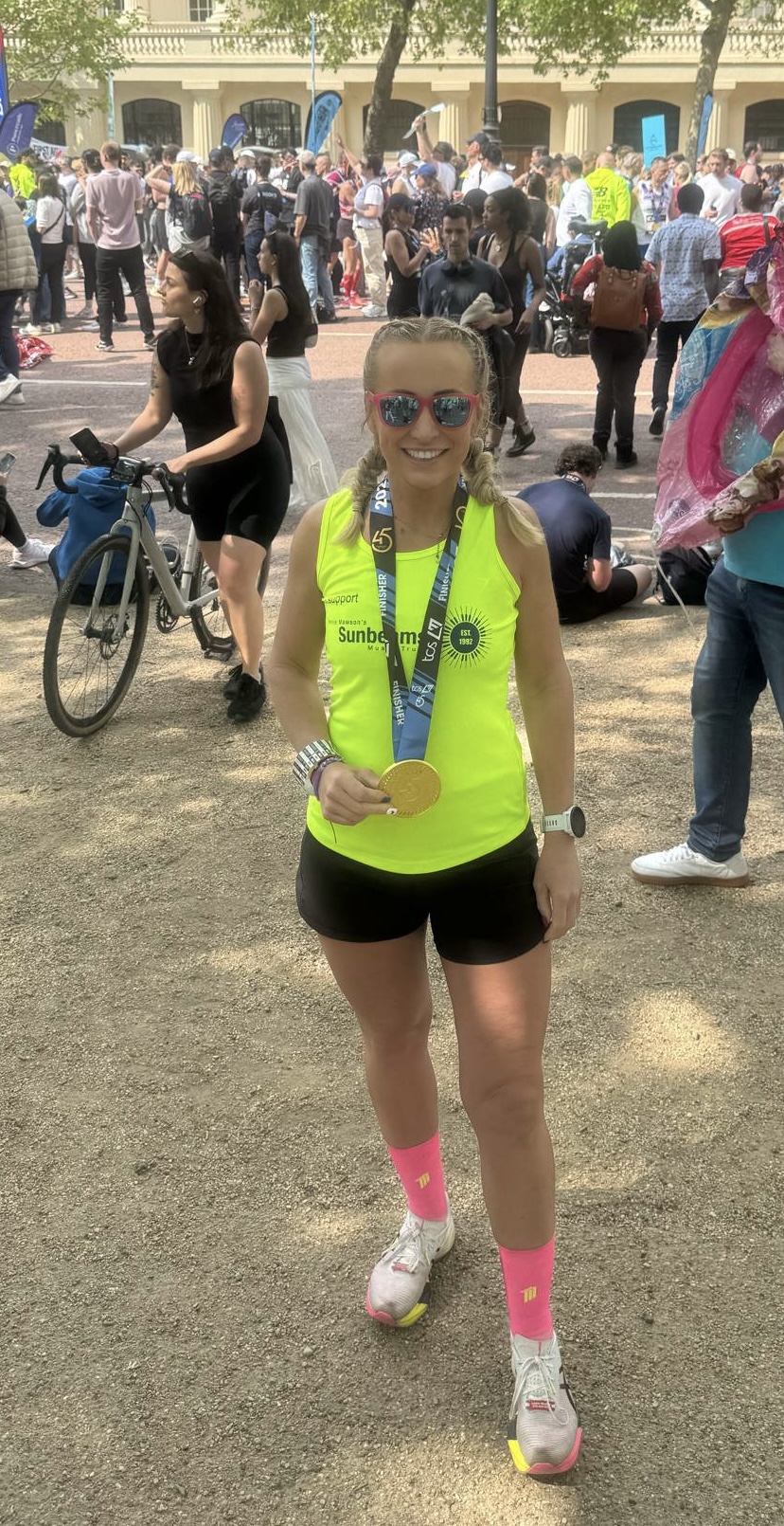 Franny at the finish with medal